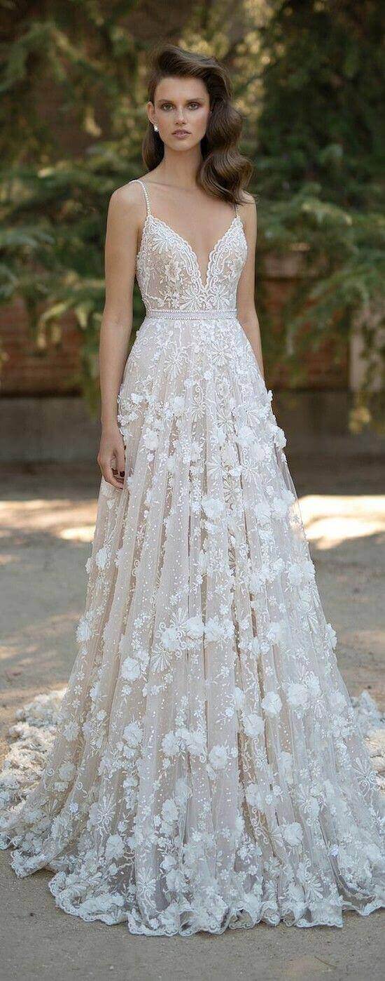 47 perfect bridal gown ideas - find yours 12 Bridal gown with a plunging v-neckline and 3d floral appliqués in a sunlit garden, featuring a flowing a-line silhouette and lace details.