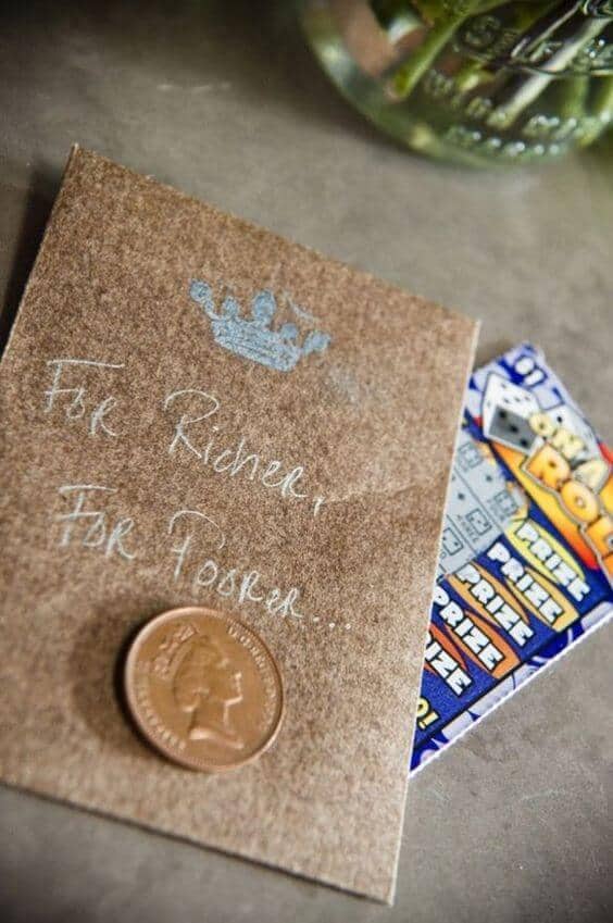 33 wedding favors for guests perfectly personalized 24 Wedding favor display featuring a kraft paper card with "for richer, for poorer," a lucky penny, and a colorful scratch-off ticket, all styled rustic-chic.