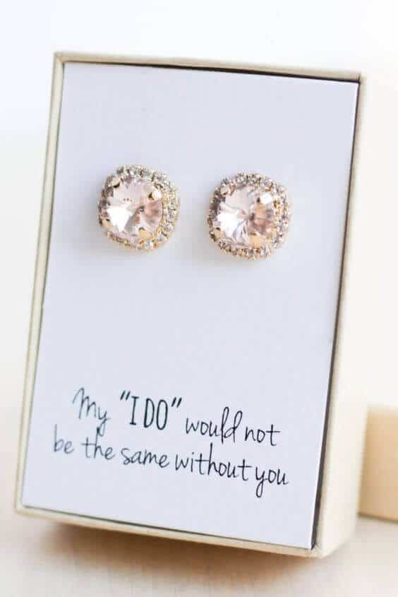 38 wedding accessories list - ideas to transform your big day into magic 15 Blush crystal halo stud earrings in ivory box, with card saying "my 'i do' would not be the same without you. " perfect for bridesmaid gifts.