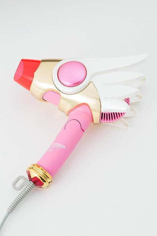 20 clever bridal shower gift ideas to be innovative 22 Compact pink-and-gold hair dryer with winged accents, ideal for bridal prep. Perfect for whimsical bridal shower gift ideas and decor.