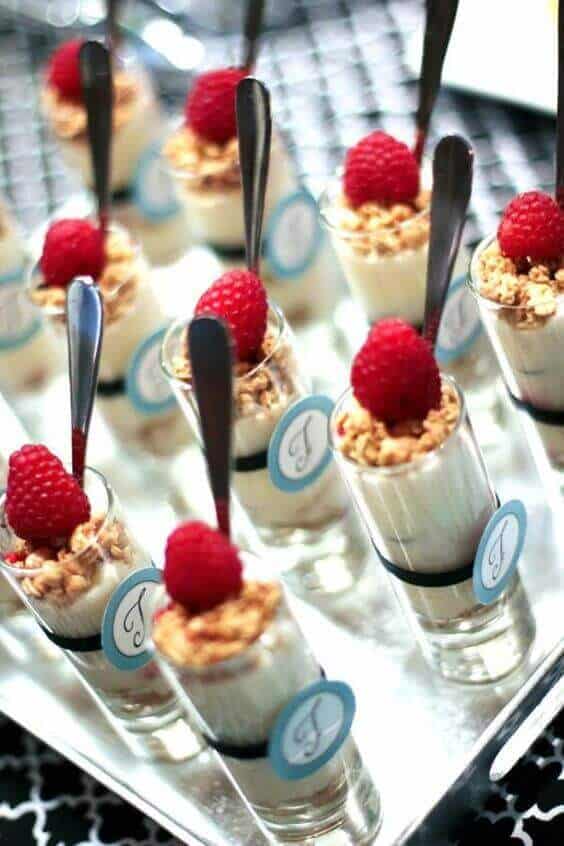 37 Morning Wedding Ideas filled with Sunshine color pallets 39 Elegant mini dessert shooters filled with creamy mousse, topped with fresh raspberries, arranged on a silver tray with blue monogram tags.